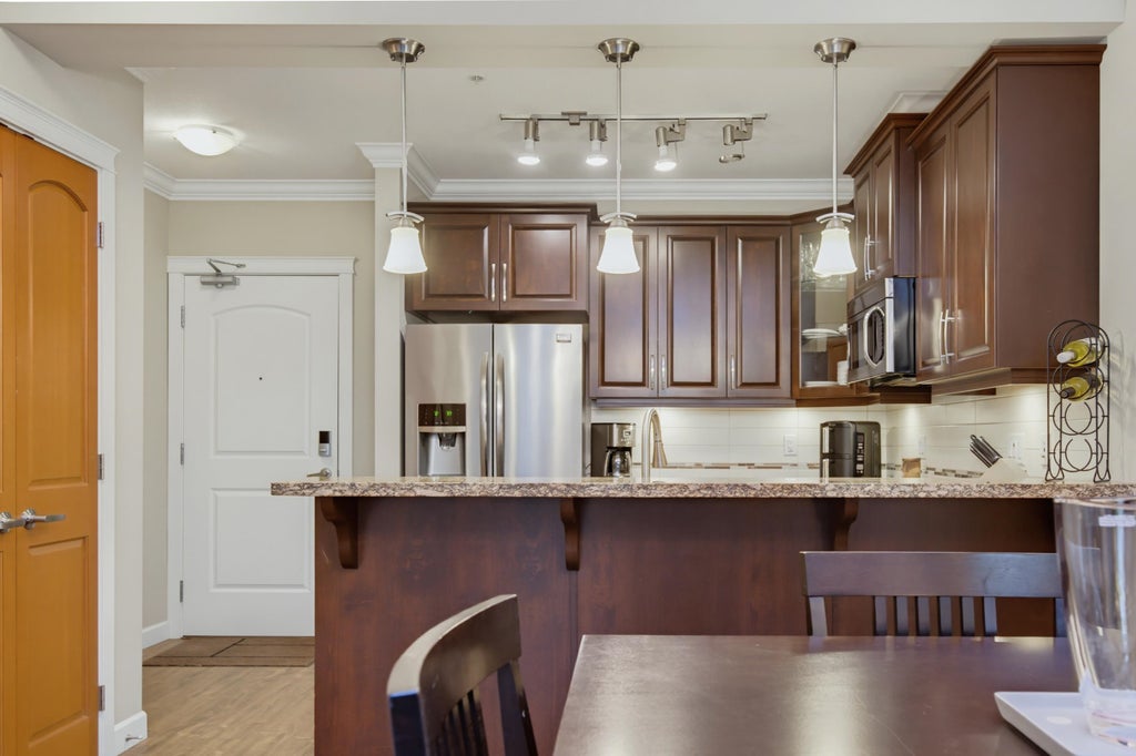 Photo of 8258 207a Street #371, Langley, BC V2Y 0N4 (MLS # R3172084)