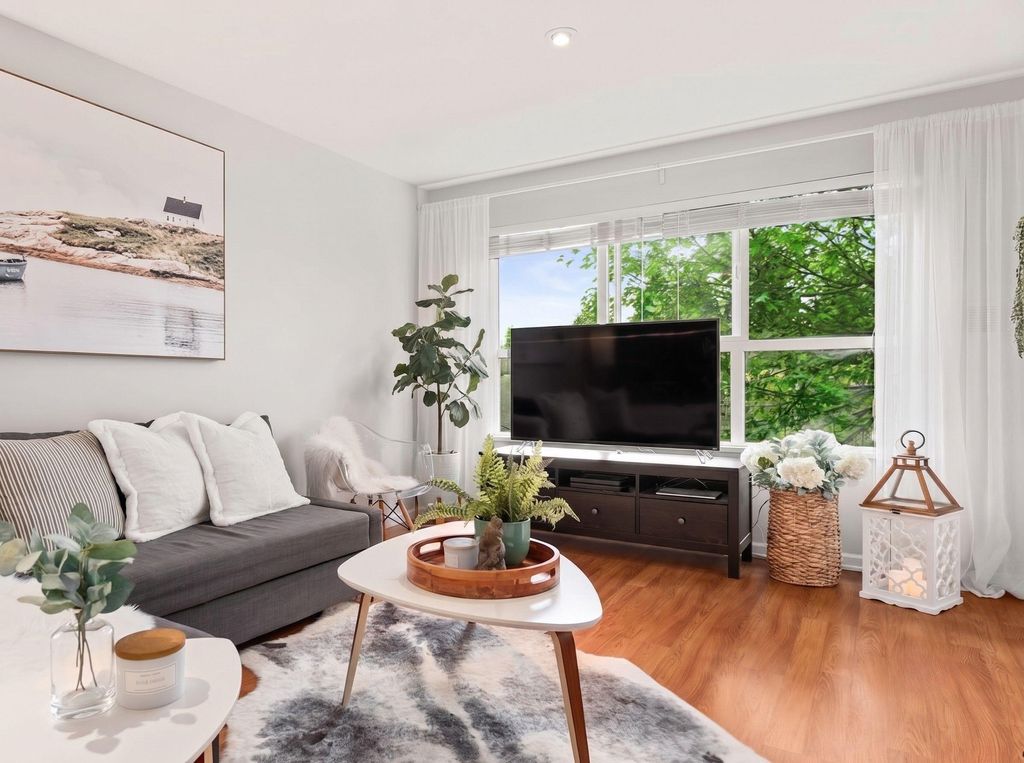 Photo of 10188 155 Street #311, Surrey, BC V3R 0R6 (MLS # R3148519)