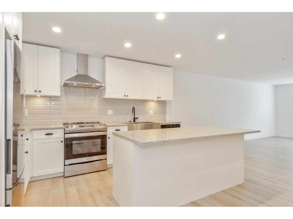 Photo of 20487 65 Avenue #A108, Langley, BC V2Y 3K5 (MLS # R3166145)