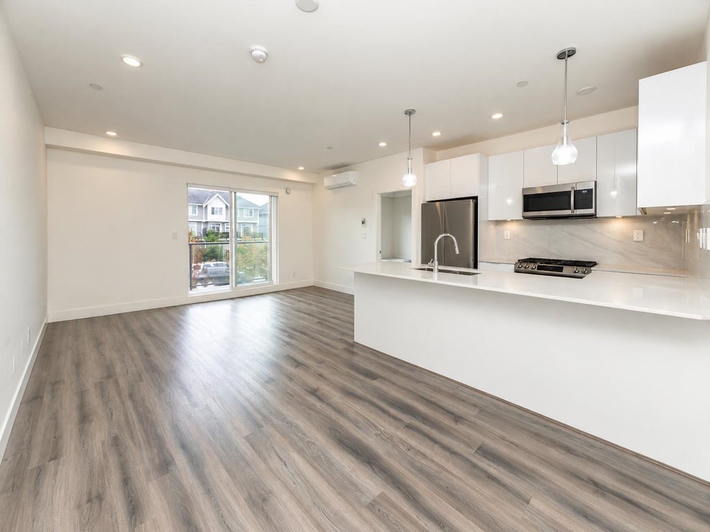 Photo of 8447 202 Street #A213, Langley, BC V2Y 2B7 (MLS # R3163331)