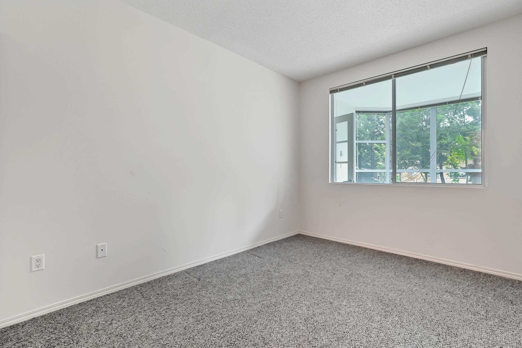 Photo of 12148 224 Street #108, Maple Ridge, BC V2X 3N8 (MLS # R3172408)