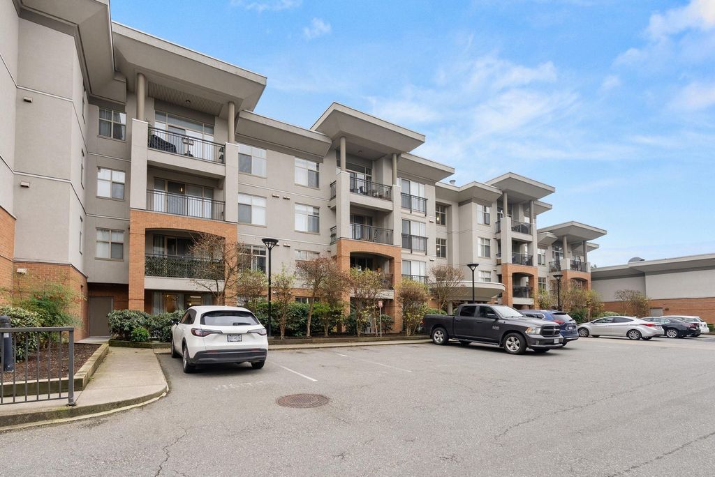 Photo of 33545 Rainbow Avenue #103, Abbotsford, BC V2S 0B9 (MLS # R3072235)