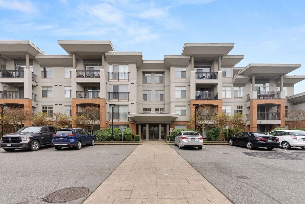 Photo of 33545 Rainbow Avenue #103, Abbotsford, BC V2S 0B9 (MLS # R3072235)
