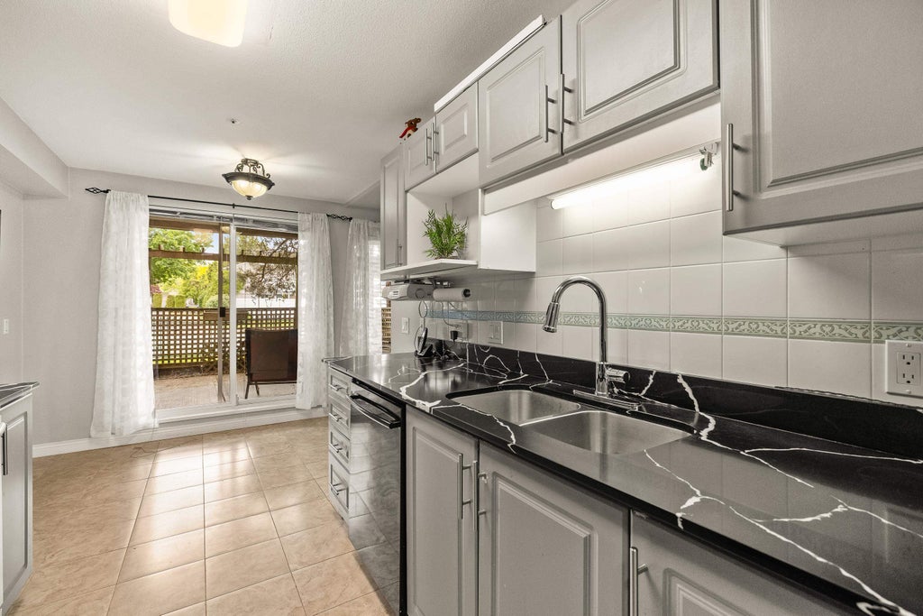Photo of 20433 53 Avenue #104, Langley, BC V3A 7A6 (MLS # R3165537)