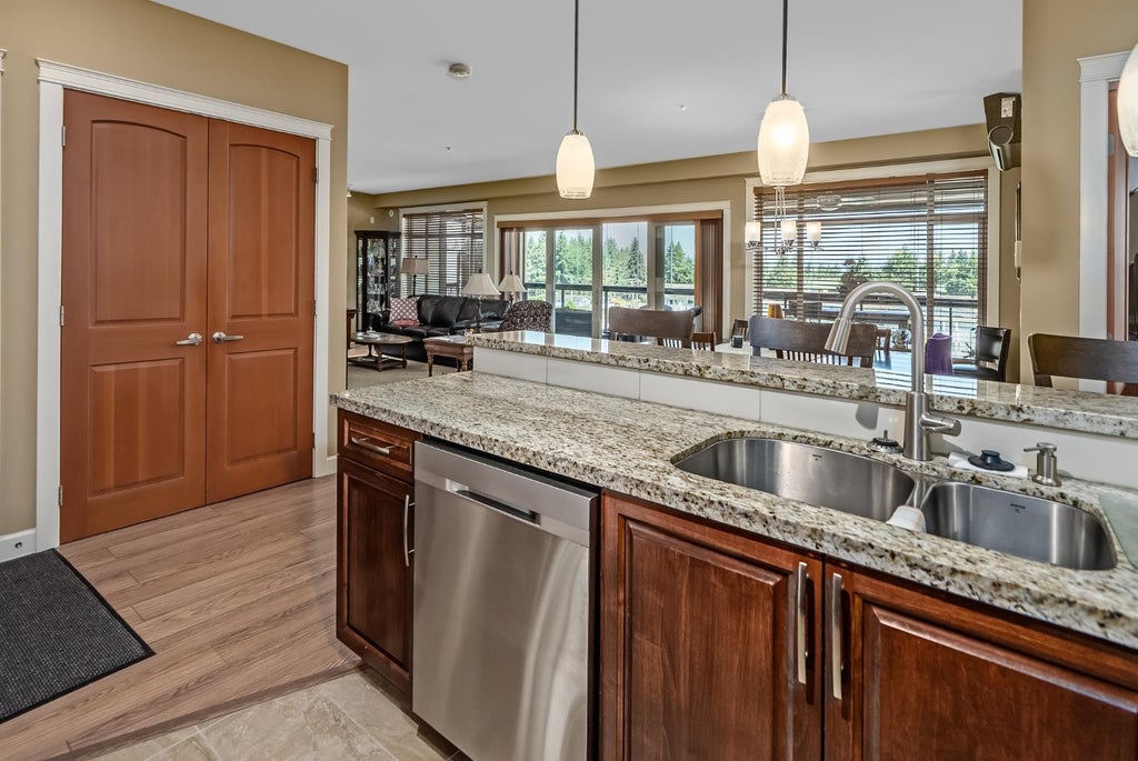 Photo of 32445 Simon Avenue #409, Abbotsford, BC V2T 5E3 (MLS # R3129724)