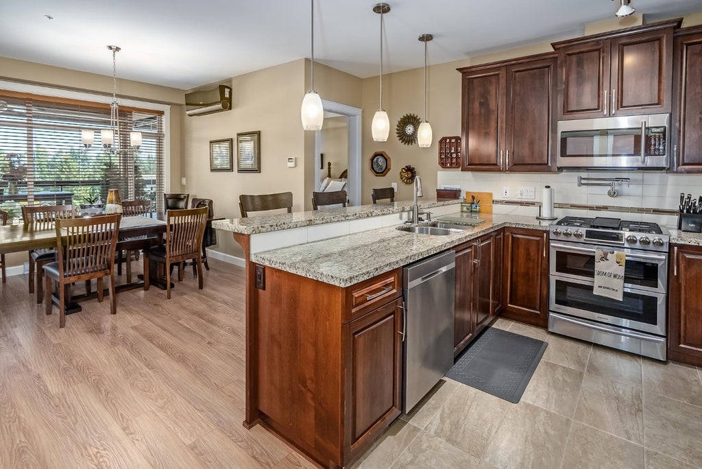 Photo of 32445 Simon Avenue #409, Abbotsford, BC V2T 5E3 (MLS # R3129724)