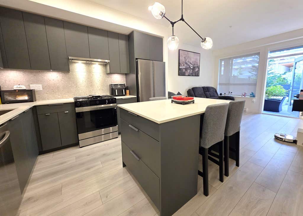 Photo of 7936 206 Street #117, Langley, BC V2Y 3X1 (MLS # R3131215)
