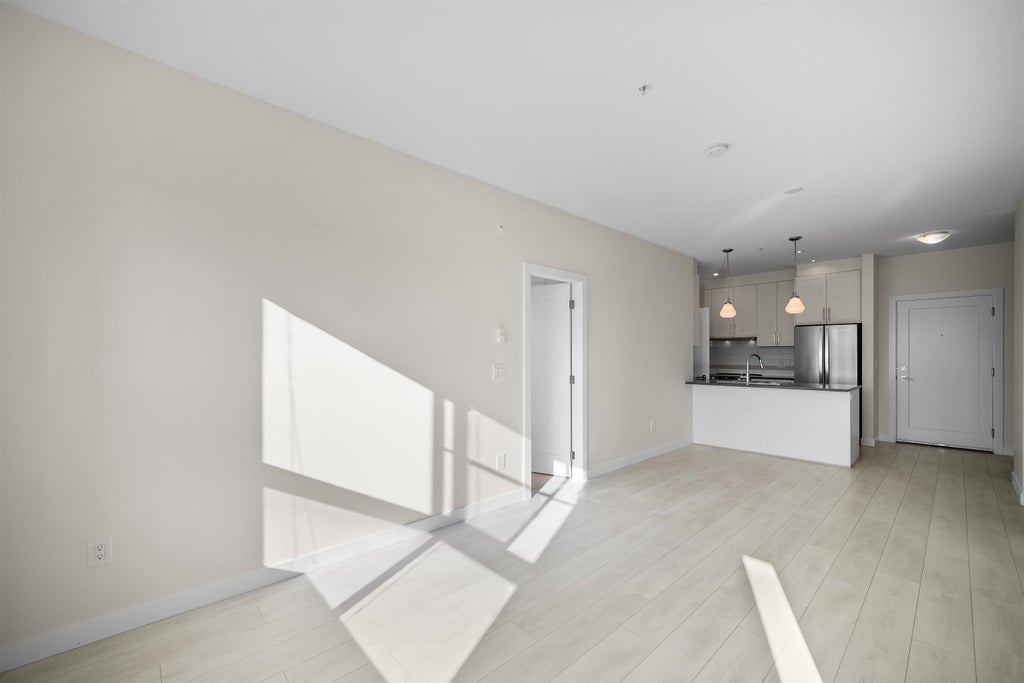 Photo of 20829 77a Avenue #406, Langley, BC V2Y 0Y5 (MLS # R3166039)
