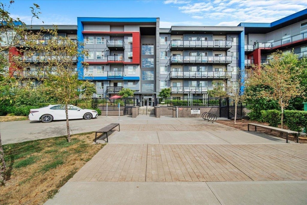 Photo of 5486 199a Street #420, Langley, BC V3A 0N6 (MLS # R3166656)