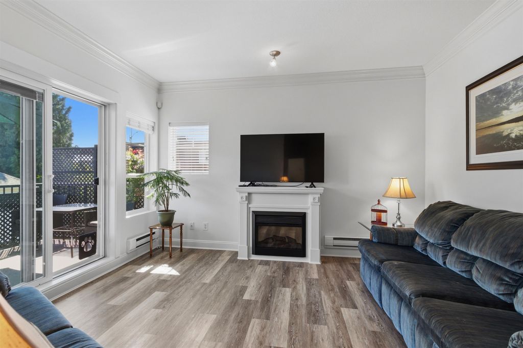 Photo of 22150 Dewdney Trunk Road #411, Maple Ridge, BC V2X 3H6 (MLS # R3147041)