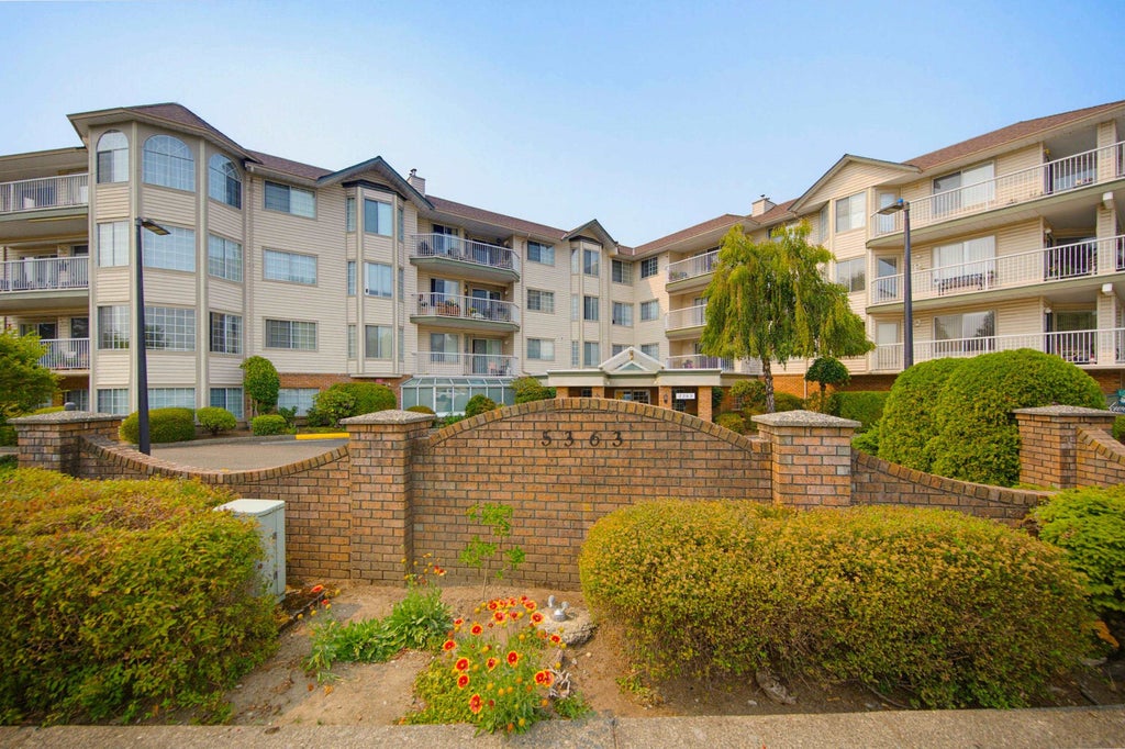 Photo of 5363 206 Street #210, Langley, BC V3A 2C5 (MLS # R3166953)