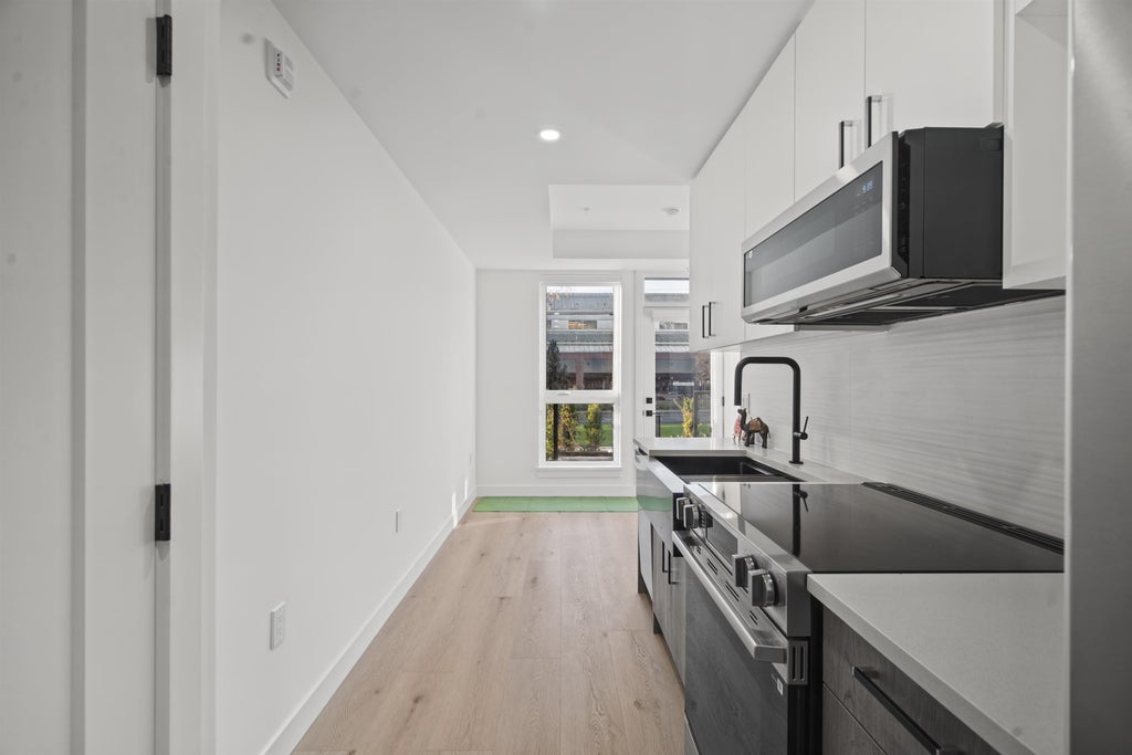 Photo of 10405 147 Street #105, Surrey, BC V3R 0J5 (MLS # R3177295)
