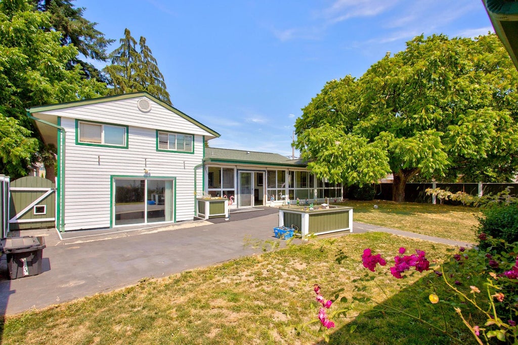 Photo of 12488 92 Avenue, Surrey, BC V3V 1G5 (MLS # R3148700)