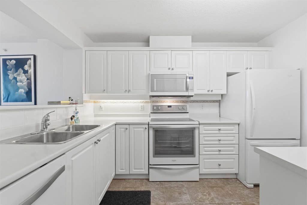 Photo of 12148 224 Street #411, Maple Ridge, BC V2X 3N8 (MLS # R3137775)