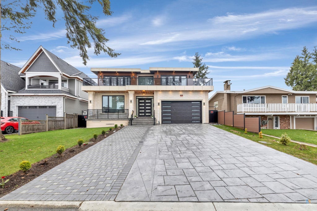 Photo of 12621 89a Avenue, Surrey, BC V3V 1B2 (MLS # R3157187)