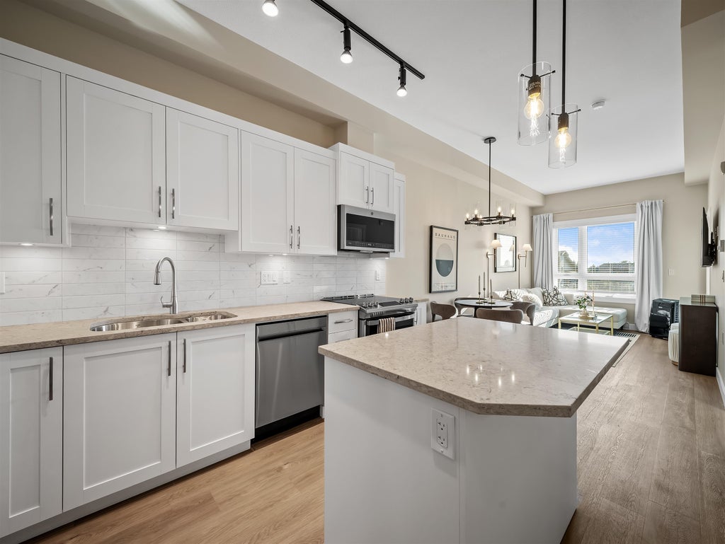 Photo of 8233 208b Street Street #A520, Langley, BC V2Y 4M7 (MLS # R3177133)