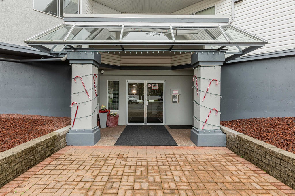 Photo of 5377 201a Street #205, Langley, BC V3A 1S7 (MLS # R3149347)