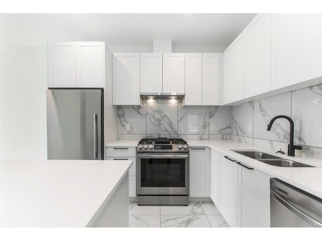 Photo of 5415 Brydon Crescent #109, Langley, BC V3A 4A3 (MLS # R3147749)