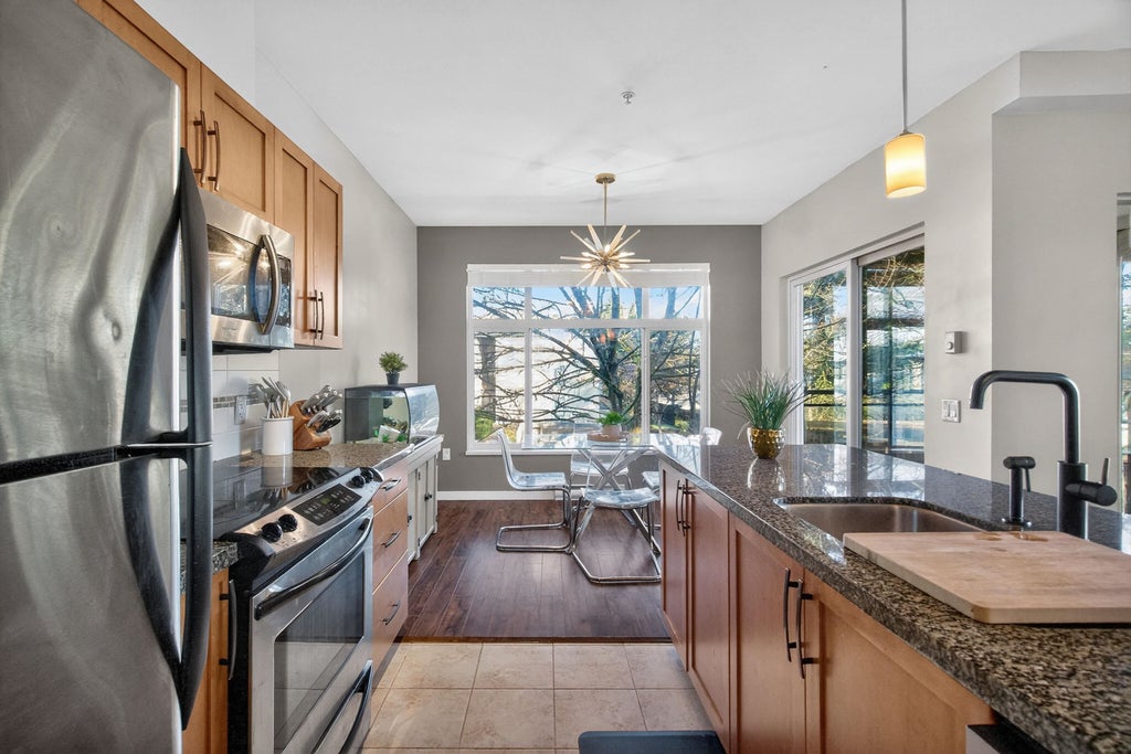 Photo of 11950 Harris Road #201, Pitt Meadows, BC V3Y 0B7 (MLS # R3175402)