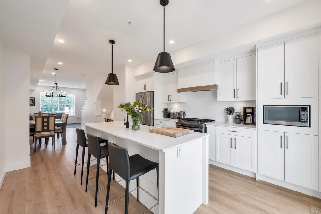 Photo of 7967 197 Street #104, Langley, BC V2Y 3P1 (MLS # R3171441)