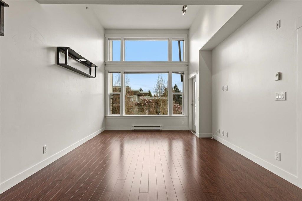 Photo of 33539 Holland Avenue #412, Abbotsford, BC V2S 0C6 (MLS # R3111143)