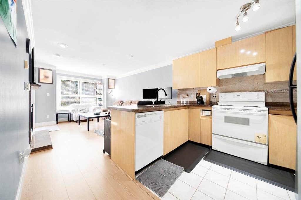 Photo of 8115 121a Street #210, Surrey, BC V3W 1J2 (MLS # R3157555)