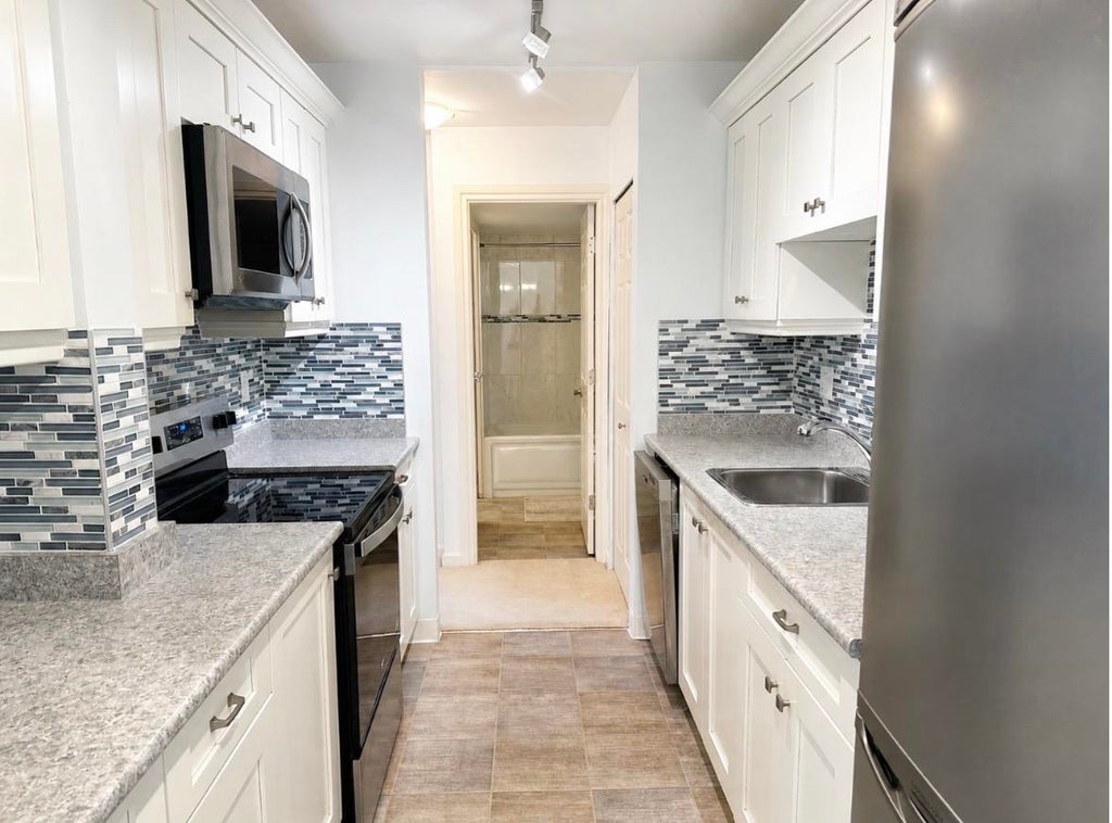 Photo of 1850 Southmere Crescent #205, Surrey, BC V4A 6Y6 (MLS # R3149104)