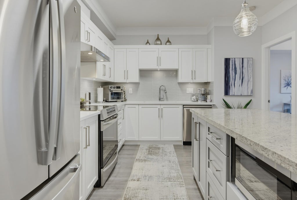 Photo of 20630 Douglas Crescent #209, Langley, BC V3A 4B8 (MLS # R3164973)