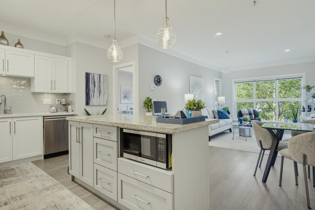 Photo of 20630 Douglas Crescent #209, Langley, BC V3A 4B8 (MLS # R3164973)