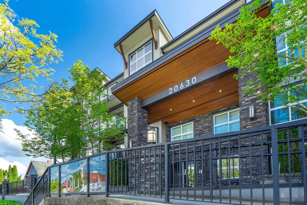 Photo of 20630 Douglas Crescent #209, Langley, BC V3A 4B8 (MLS # R3164973)