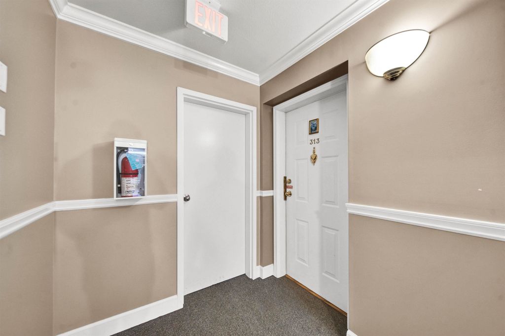 Photo of 9763 140 Street #313, Surrey, BC V3T 4M4 (MLS # R3131272)
