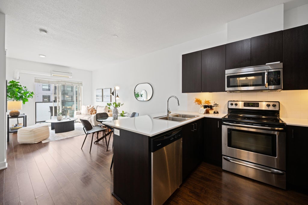Photo of 20460 Douglas Crescent #416, Langley, BC V3A 0C6 (MLS # R3171214)