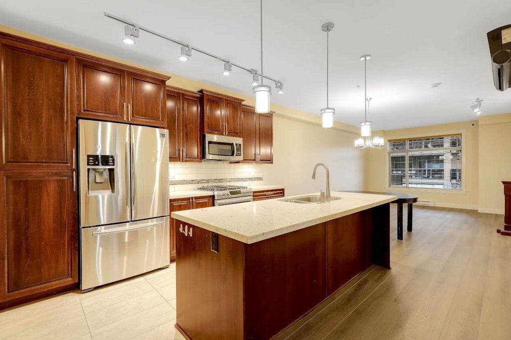 Photo of 20716 Willoughby Town Centre Drive #A303, Langley, BC V2Y 3J7 (MLS # R3160160)