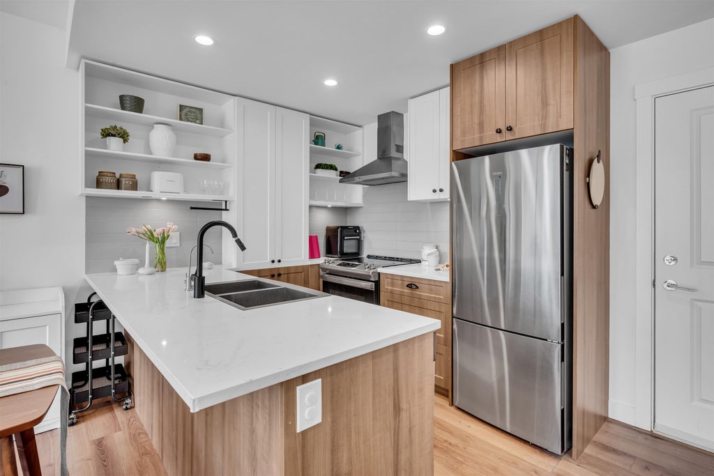 Photo of 20487 65 Avenue #B209, Langley, BC V2Y 3K6 (MLS # R3148632)