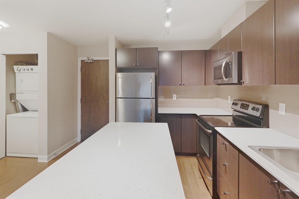 Photo of 13740 75a Avenue #417, Surrey, BC V3W 0E8 (MLS # R3131687)