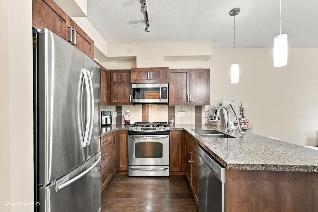 Photo of 20058 Fraser Highway #207, Langley, BC V3A 0E5 (MLS # R3177780)