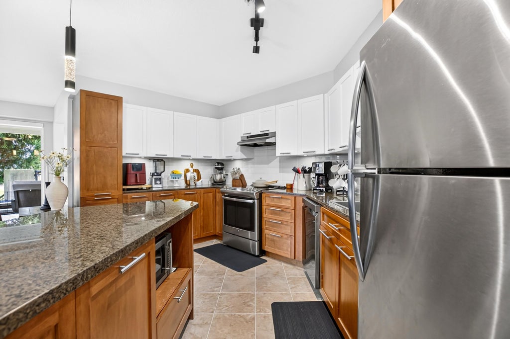 Photo of 19673 Meadow Gardens Way #123, Pitt Meadows, BC V3Y 0A1 (MLS # R3171889)
