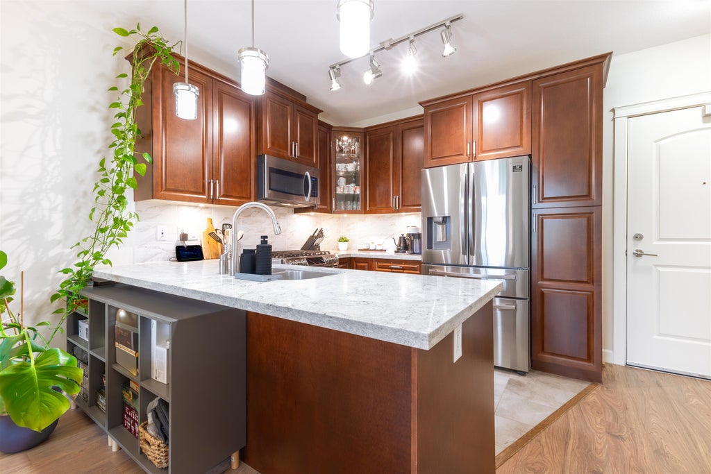 Photo of 14588 Mcdougall Drive #511, Surrey, BC V4P 0H1 (MLS # R3124405)