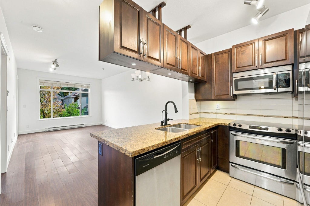 Photo of 12525 190a Street #212, Pitt Meadows, BC V3Y 0E1 (MLS # R3175958)