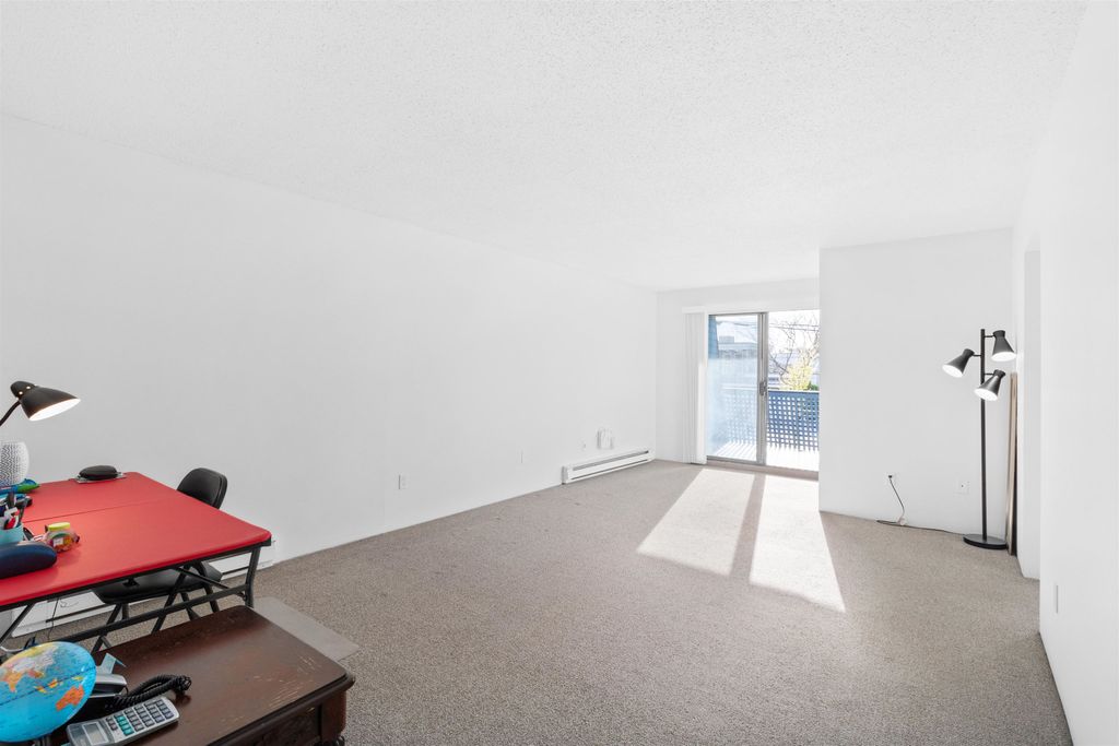 Photo of 17661 58a Avenue #103, Surrey, BC V3S 1N4 (MLS # R3097052)