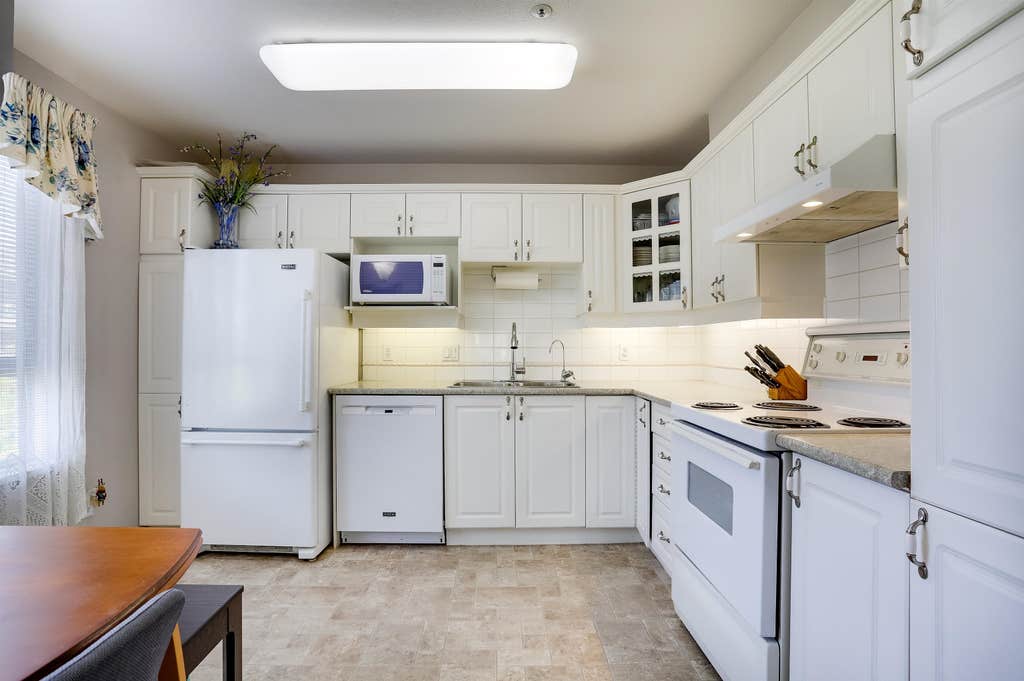 Photo of 20145 55a Avenue #204, Langley, BC V3A 8L6 (MLS # R3141623)