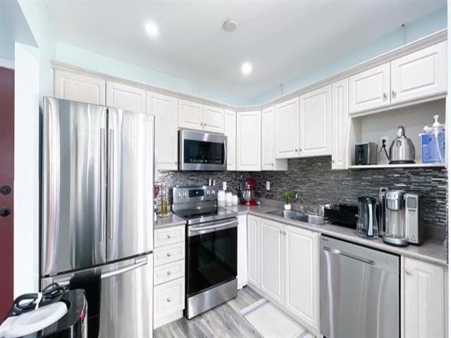 Photo of 33480 George Ferguson Way #408, Abbotsford, BC V2S 8G1 (MLS # R3148393)