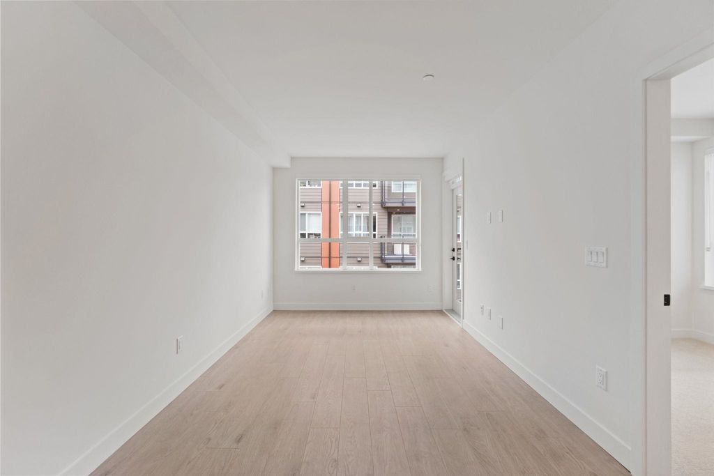 Photo of 13258 105 Avenue #418, Surrey, BC V3T 1Z2 (MLS # R3097170)