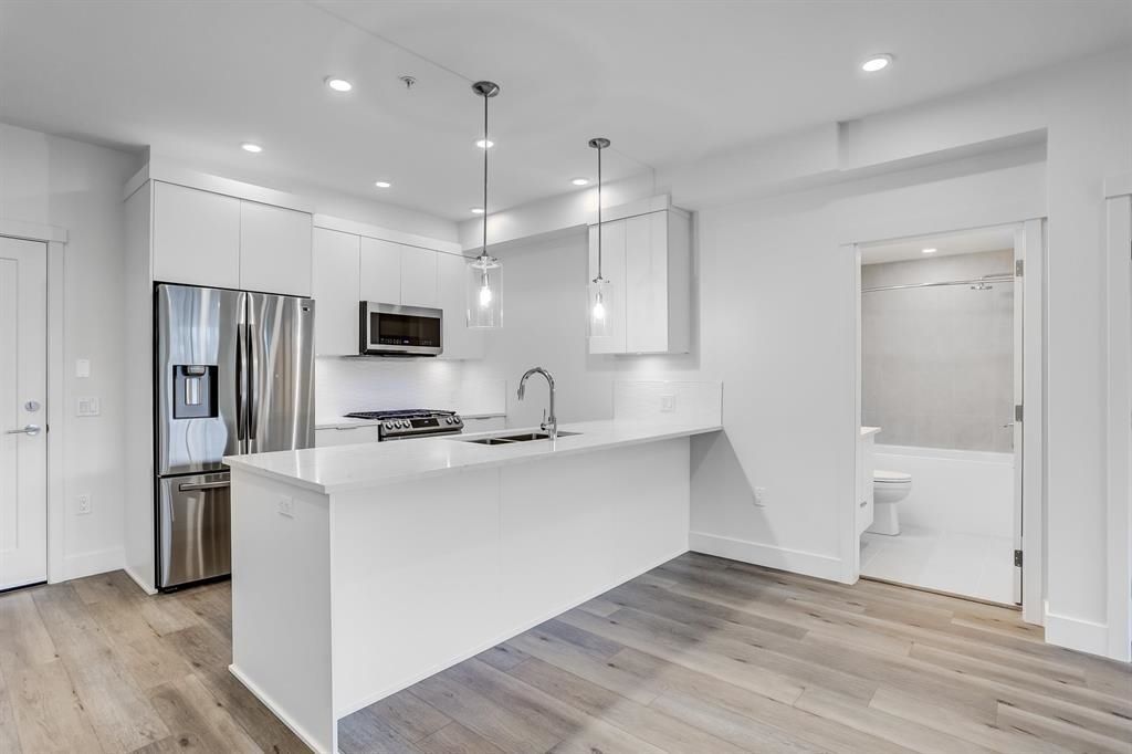 Photo of 11865 227 Street #311, Maple Ridge, BC V2X 6H9 (MLS # R3112704)