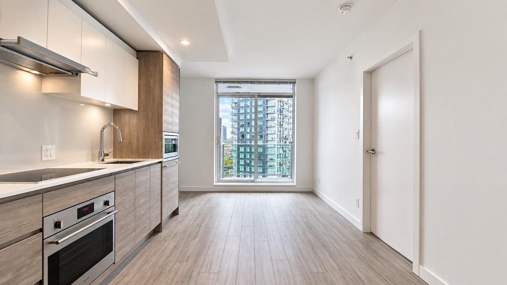 Photo of 13655 Fraser Highway #1006, Surrey, BC V3T 0P8 (MLS # R3171524)