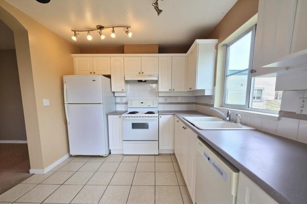 Photo of 20110 Michaud Crescent #410, Langley, BC V3A 4B1 (MLS # R3115201)