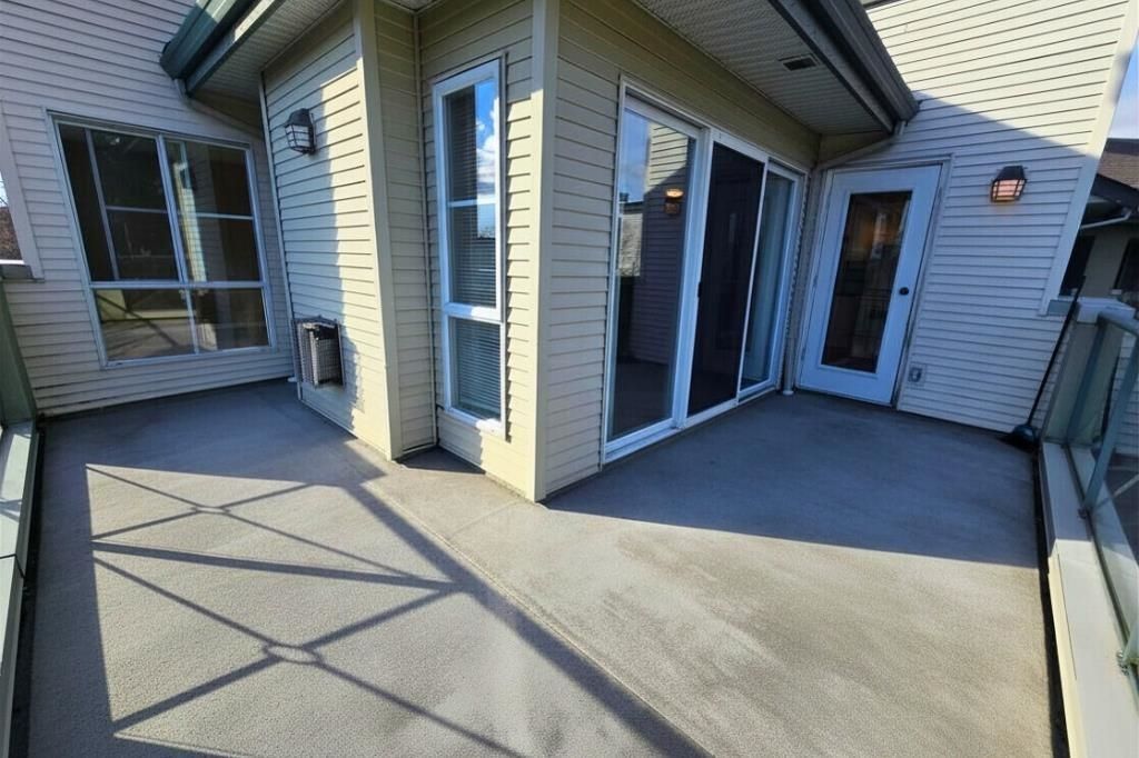 Photo of 20110 Michaud Crescent #410, Langley, BC V3A 4B1 (MLS # R3115201)