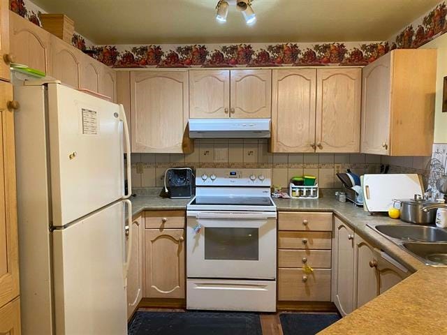 Photo of 10756 N 138 Street #313, Surrey, BC V3T 4K5 (MLS # R3158088)