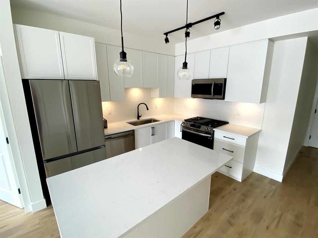 Photo of 19935 75a Avenue #206, Langley, BC V2Y 4L6 (MLS # R3147384)
