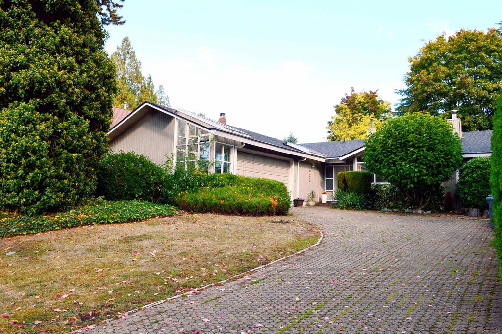 Photo of 10430 Fraserglen Drive, Surrey, BC V4N 1T5 (MLS # R3173028)